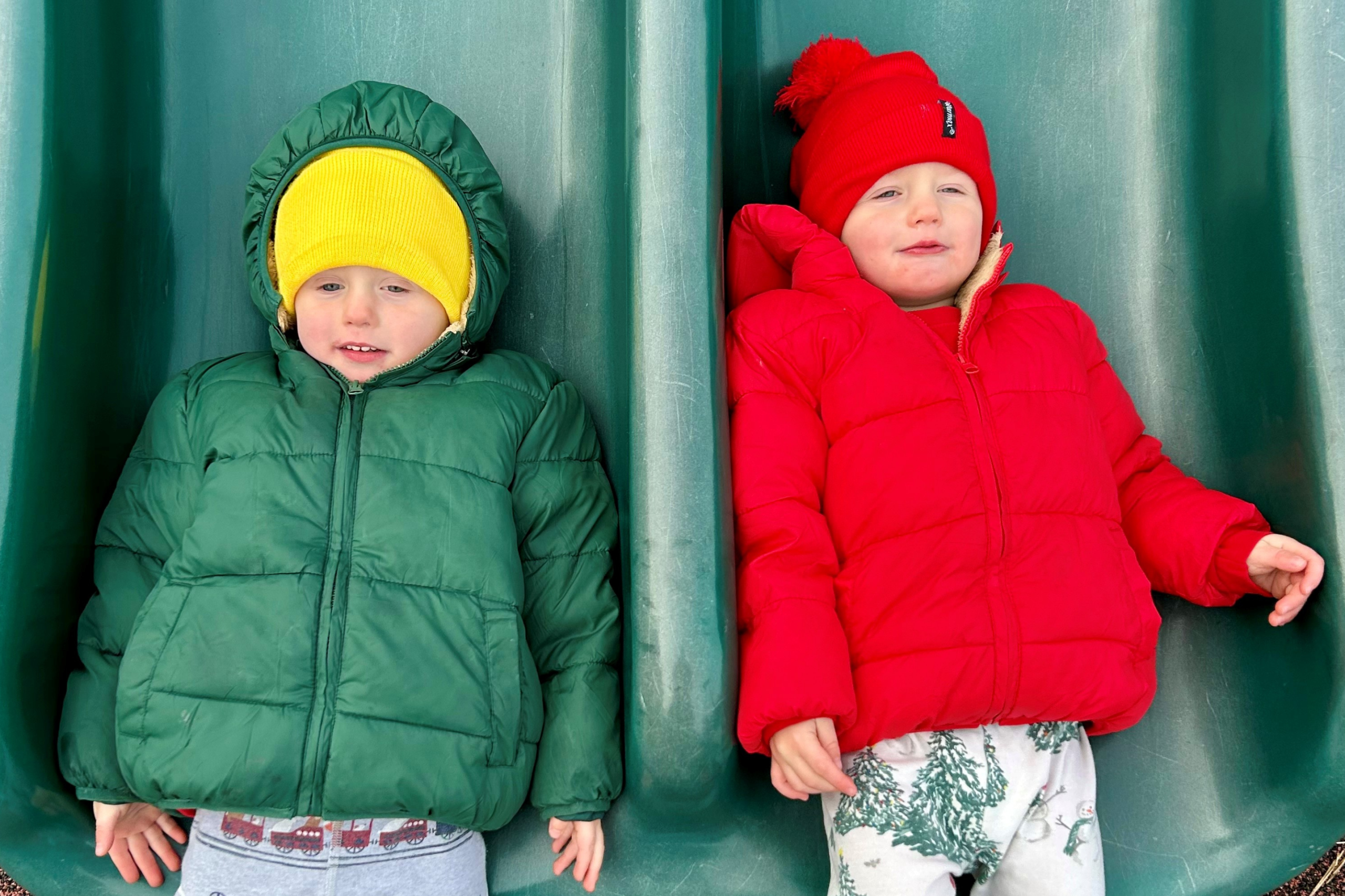 Childhood photo of Treasurer Frerichs with his grandfather on a tractor