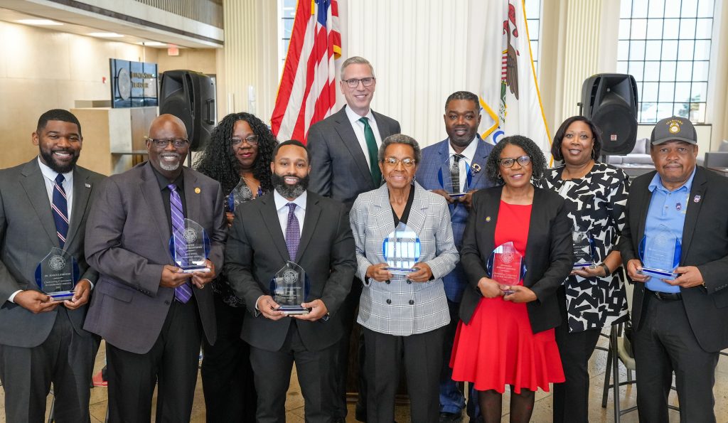 Treasurer Frerichs poses with the recipients of Black History Month awards for 2026