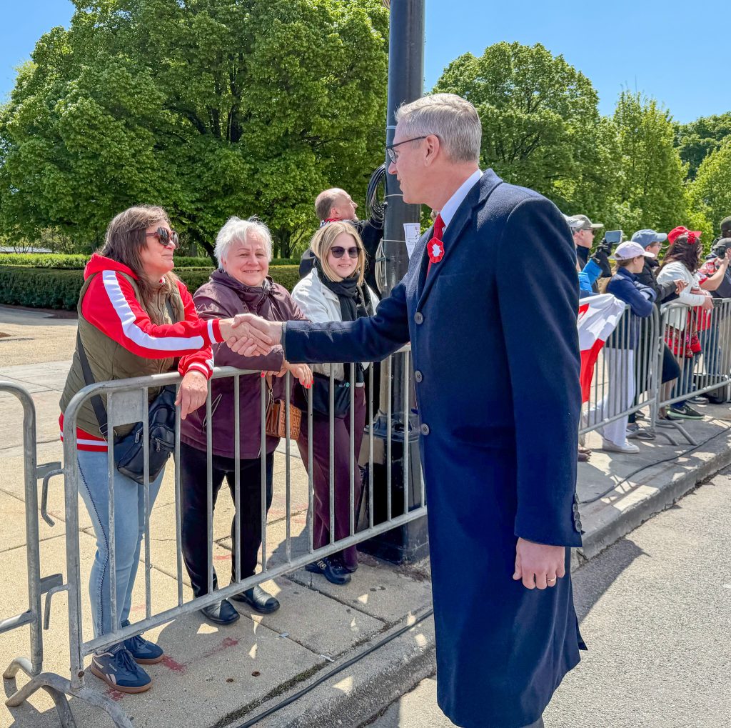 Treasurer Frerichs shaking hands at the Polish Constitution Day Parade
