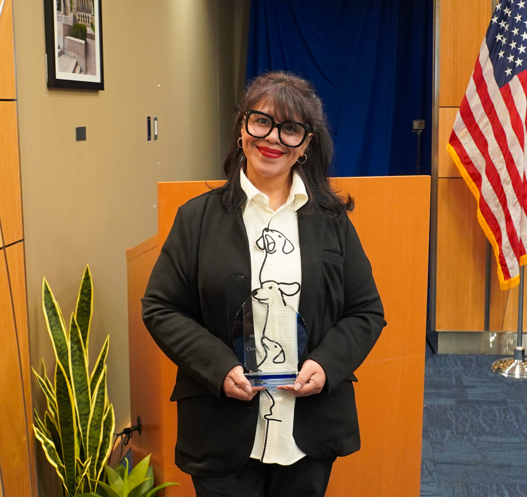 Christopher Mallette with award at Black History Month Event